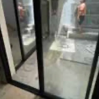 Installing an aluminium-framed glass door