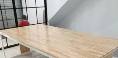 Solid-wood table on a white steel frame