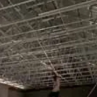 Light-steel roof truss and scaffolding inside a building
