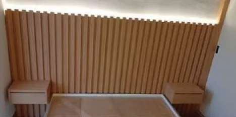 Wood-slat headboard wall with floating nightstands